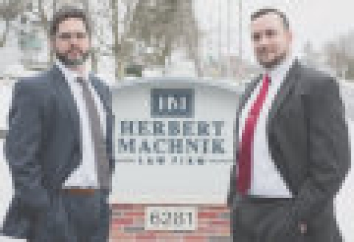 Herbert Machnik Law Firm Logo